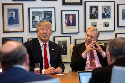 President-elect Donald Trump, left, and New York Times Publisher Arthur Sulzberger Jr., right, appear during a meeting with editors and reporters at The New York Times building, Tuesday, Nov. 22, 2016 in New York. (Hiroko Masuike/The New York Times via AP)